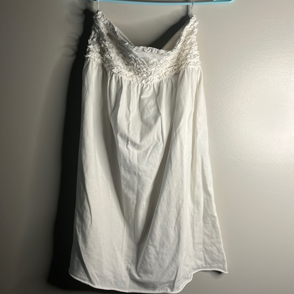 Child’s white beach coverup